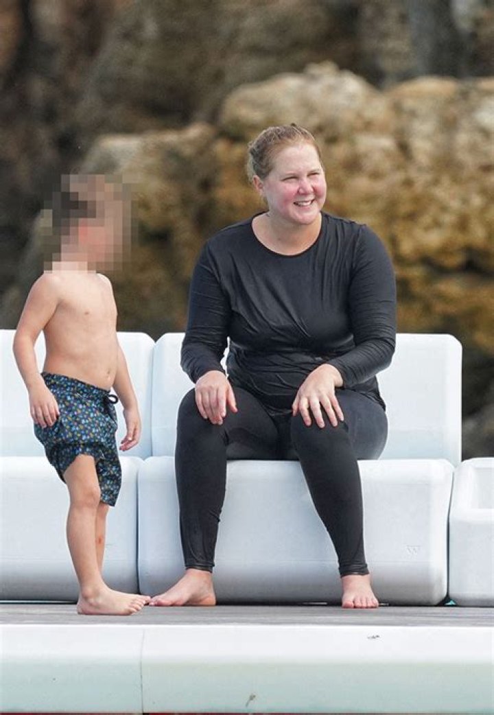 Amy Schumer Gives Son Gene, 3, A Piggyback Ride On St. Barts Vacation: Photos