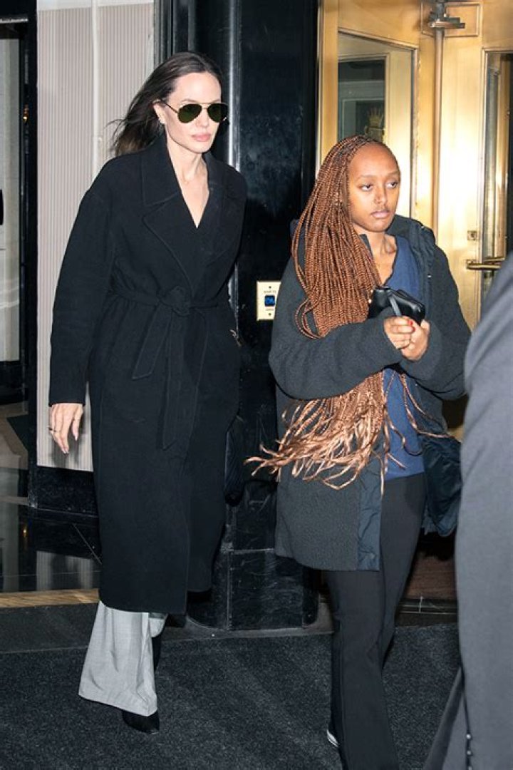 Angelina Jolie & Daughter Zahara Hold Hands At JFK Airport: Photo – Hollywood Life