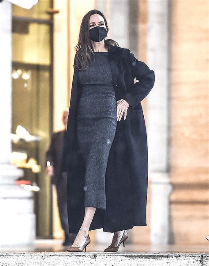 Angelina Jolie Gets Caught In The Rain While Strolling Through Rome In Heels: Photos