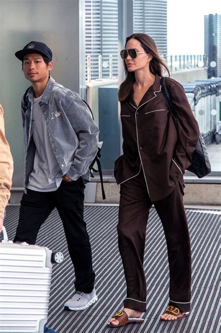 Angelina Jolie Wears Silk Pajamas Walking Through London Airport With Son Pax, 18: Photo