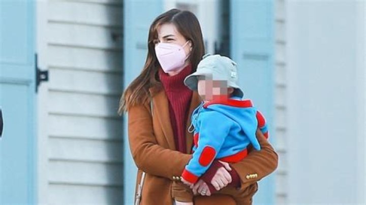 Anne Hathaway Carries Son Jack, 1, In Rare Family Outing With Husband & Older Son Jonathan, 5