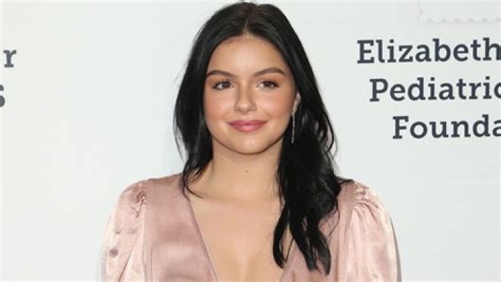 Ariel Winter Is Pretty In Pink In Cute Top With Plunging Neckline As She Strikes A Pose In Holland – Pic
