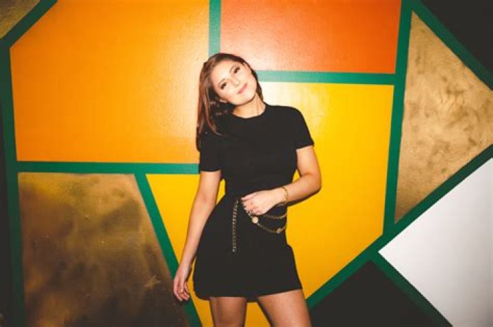 Caroline Kole Walks The Wire Between Trust & Doubt In Uplifting ‘Freaking Out’ Video – Watch