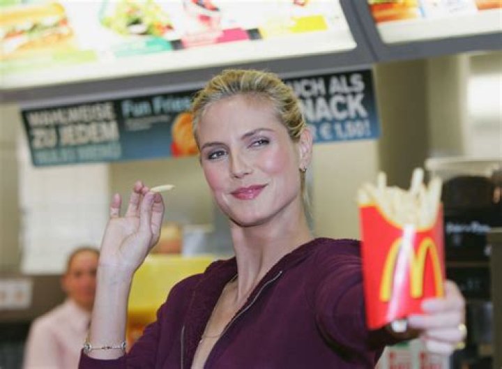 National Fast Food Day: Chrissy Teigen & More Stars Chowing Down On Greasy Treats