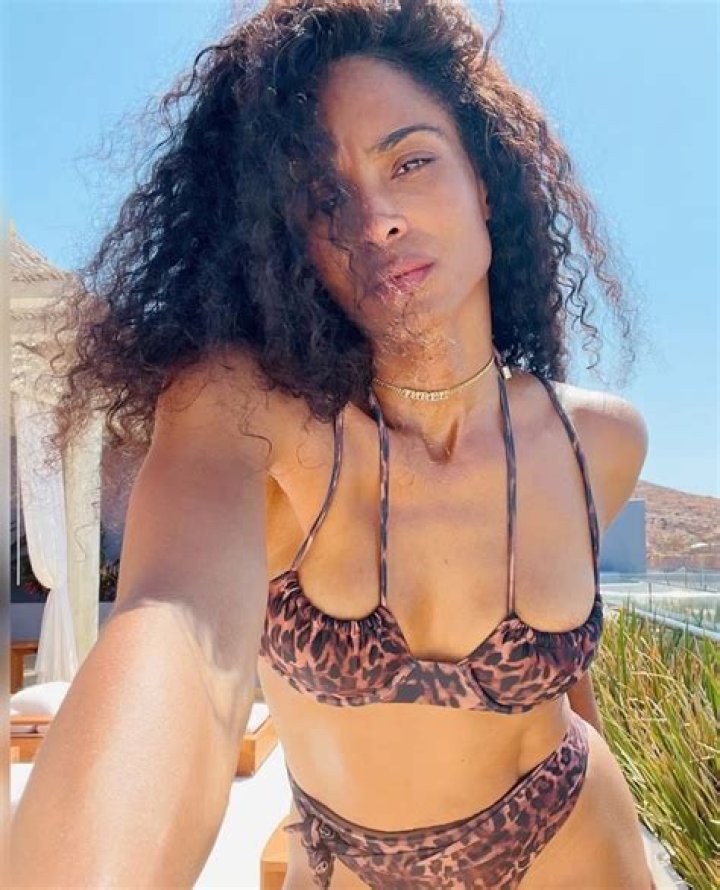 Ciara, 35, Rocks A Leopard Print Bikini & Poses On A Mansion Balcony In Gorgeous Pics