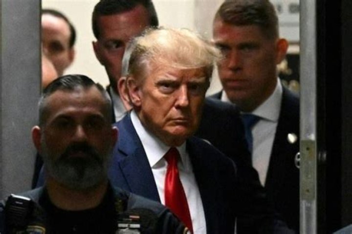 Donald Trump Smiles & Waves At Supporters In First Photos After Classified Docs Arrest