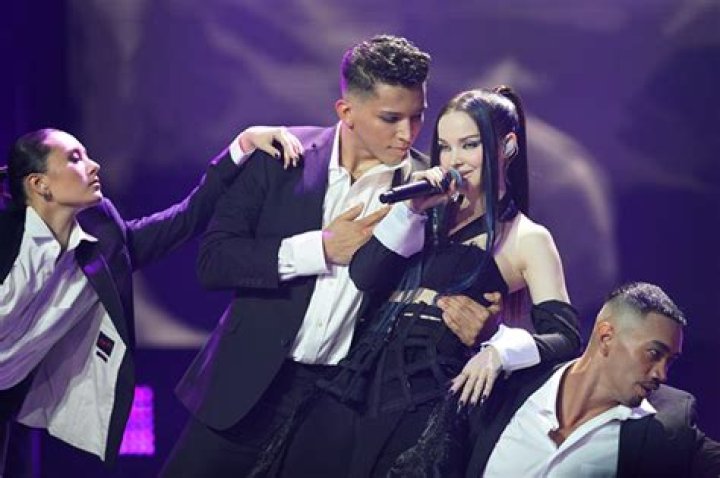 Dove Cameron Performs ‘Boyfriend’ In Ripped Tux For New Year’s Eve ’23 – Hollywood Life