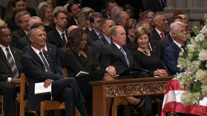 Why George W. Bush Gave Michelle Obama Candy At His Father’s Funeral — Watch