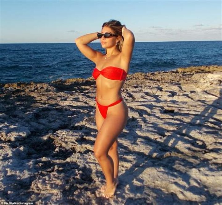 Gia Giudice Slays in Red Bikini on the Beach During Bahamas Vacation