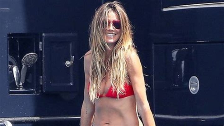 Heidi Klum, 46, Works On Her Tan As She Sunbathes In Nothing But A String Bikini – See Pics