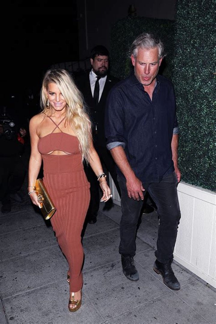 Jessica Simpson’s Cutout Brown Dress With Eric Johnson – Photos – Hollywood Life