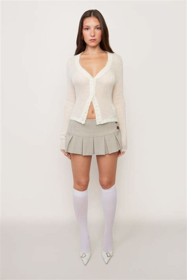 Wears Unbuttoned Cardigan & Mini Skirt – Hollywood Life