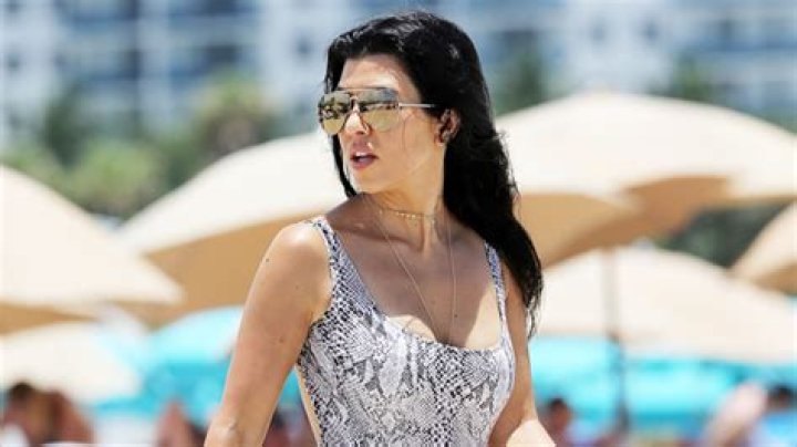 Kourtney Kardashian Plays Tennis In A Sexy Metallic Swimsuit — See Pic