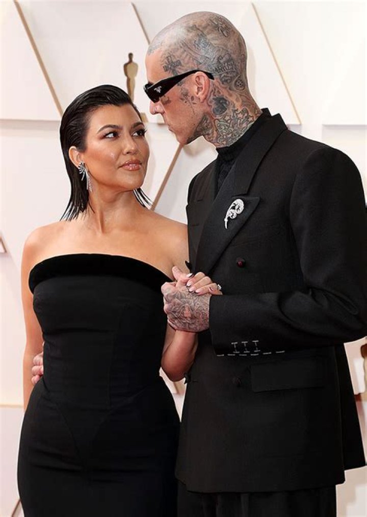 Kourtney Kardashian Slays In Tight Black Strapless Dress With Travis Barker At The Oscars