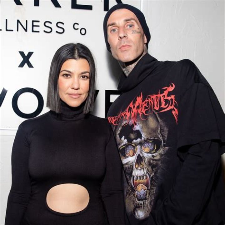 Kourtney Kardashian & Travis Barker Pack On The PDA For Fans At UFC 264 — Watch