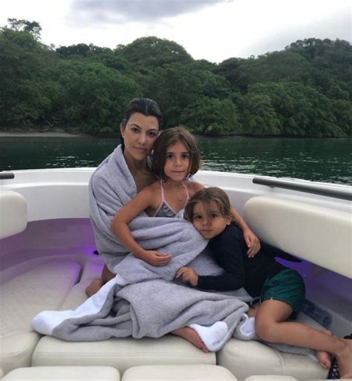 Kourtney Kardashian’s Best Vacation Pics Of Summer 2020: Bikinis, Wakeboarding & More