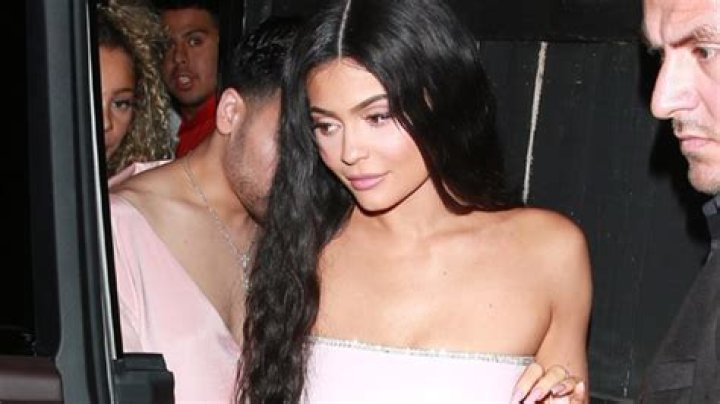 Kylie Jenner Stuns In Fitted Black Shirt & Skirt After Showing Off Her $14M Car Collection