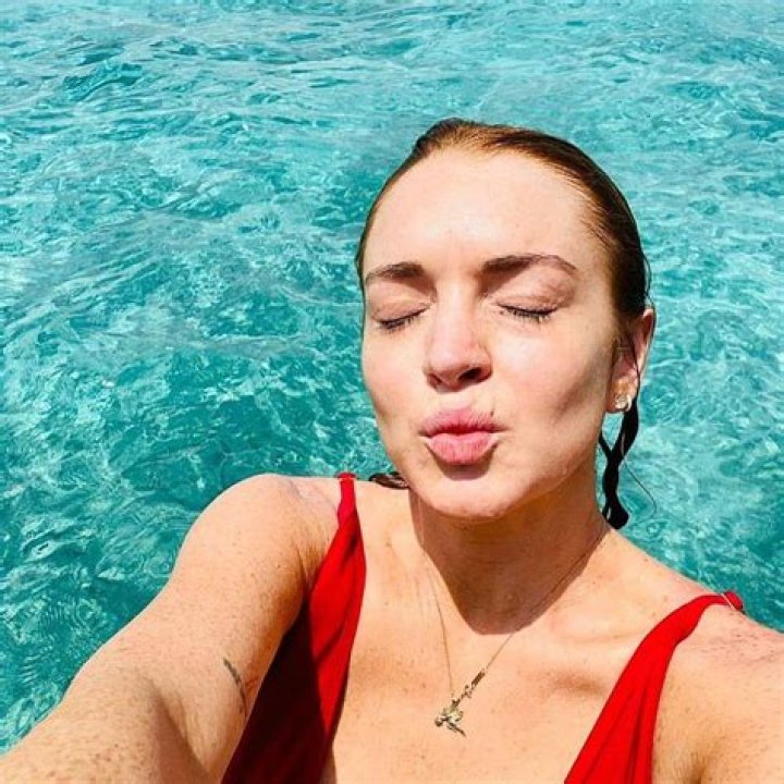 Lindsay Lohan Rocks Red Swimsuit On Vacation In Maldives — See Pics – Hollywood Life