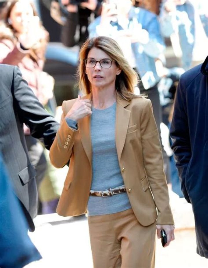Lori Loughlin Reports To Prison To Serve Time For College Admissions Scandal