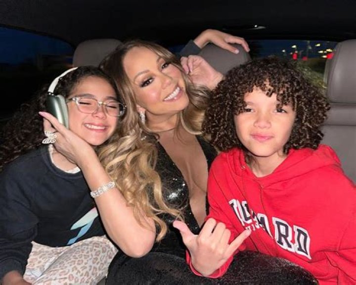 Mariah Carey Rocks Plunging Gold Dress & Reunites With Ex Nick Cannon On Thanksgiving