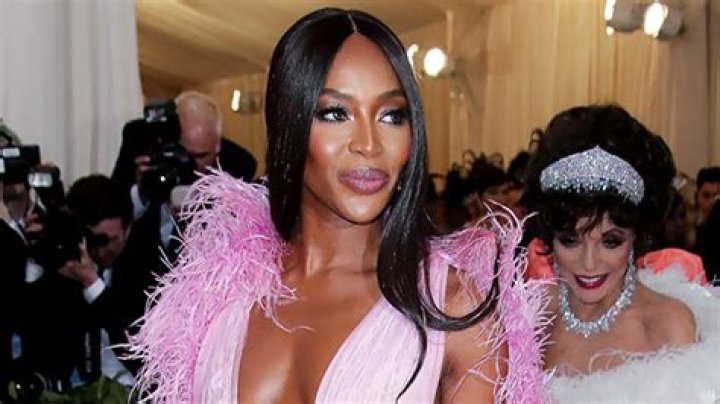 Naomi Campbell’s Plunging Swimsuit At Wellness Center – Photos – Hollywood Life