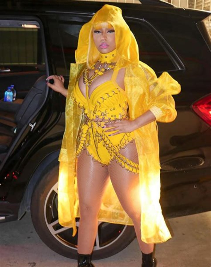 Nicki Minaj Flaunts Major Cleavage & Yellow Hair In Sexy Chain Link Bodysuit — See Pic