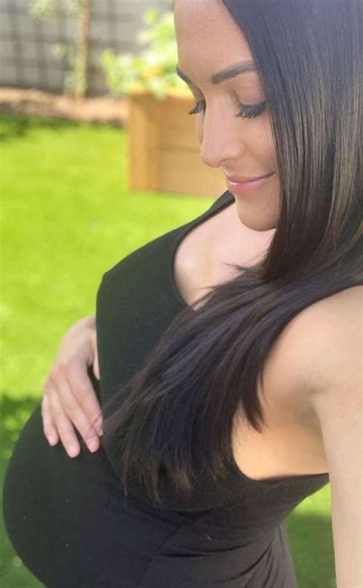Nikki Bella Shows Off Her 26-Week Baby Bump In Tight Black Shirt