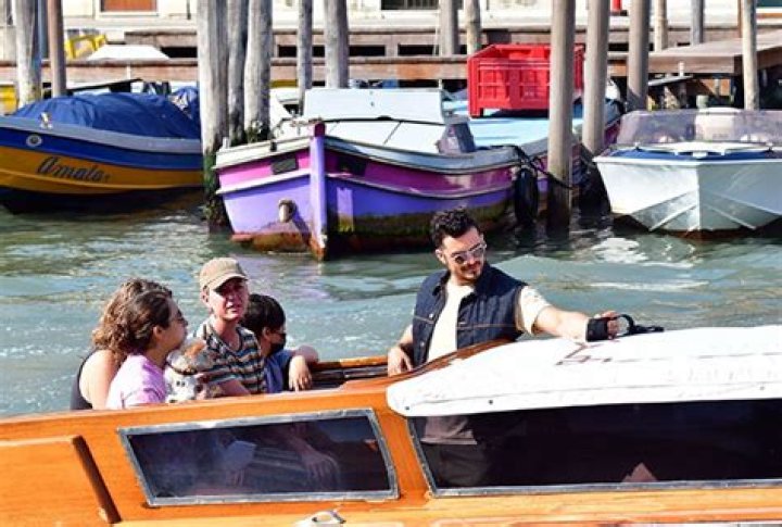 Orlando Bloom Cuddles Baby Daisy, 9 Months, As They Head On Venice Boat Ride With Katy Perry