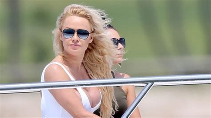 Pamela Anderson Rocks White Swimsuit For ‘Maxim’ Photo Shoot – Hollywood Life