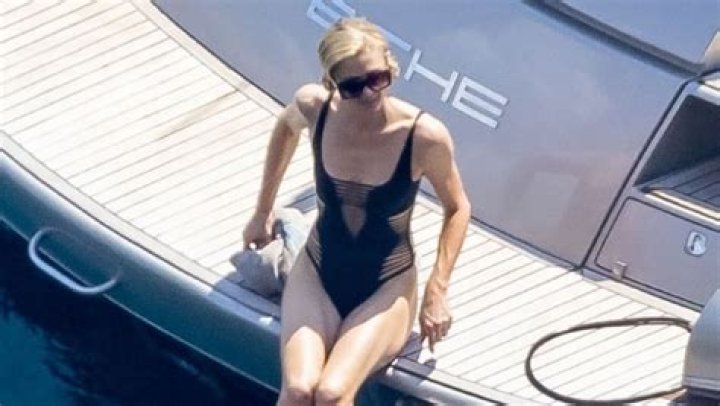 Paris Hilton Rocks Sexy Black Swimsuit As She Straddles Husband Carter Reum In Italy: Photos