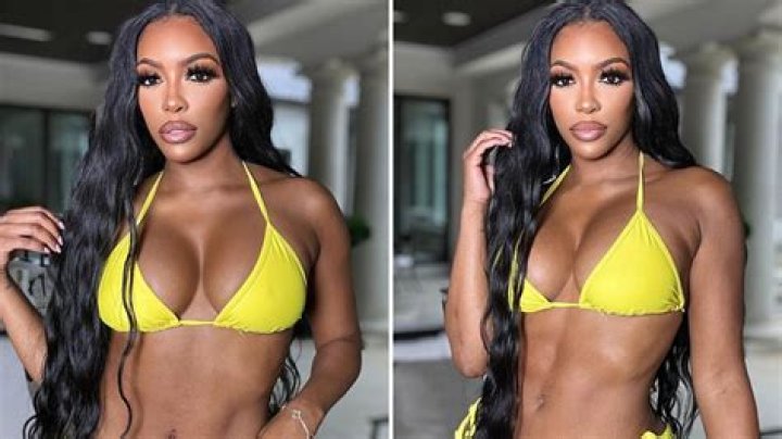 Porsha Williams Rocks Plunging Swimsuit & Cradles Baby Pilar In The Pool – Pics