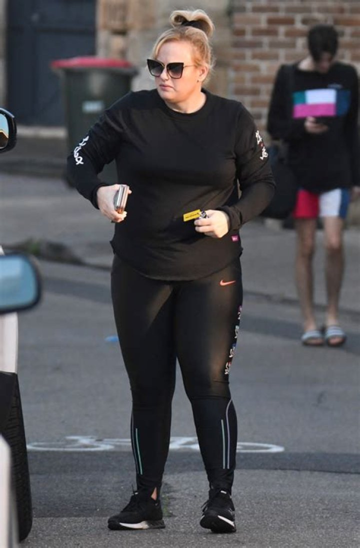 Rebel Wilson Stuns In A Crop Top & Leggings For ’80s inspired Fitness Pic After 60 Lb. Weight Loss