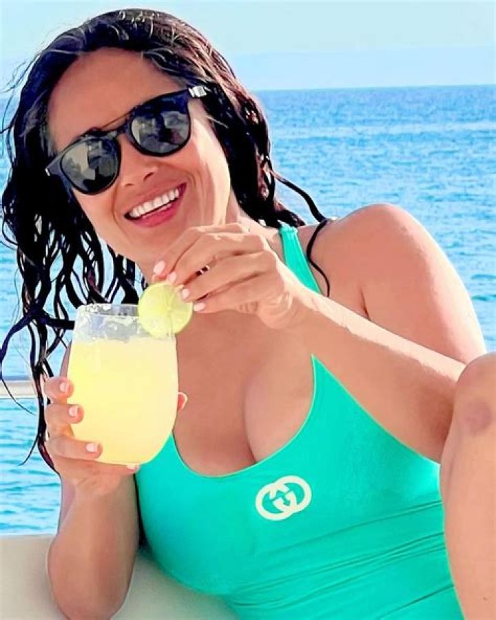 Salma Hayek Shakes Her Drenched Hair After Getting Soaking Wet In Low-Cut Swimsuit — Watch