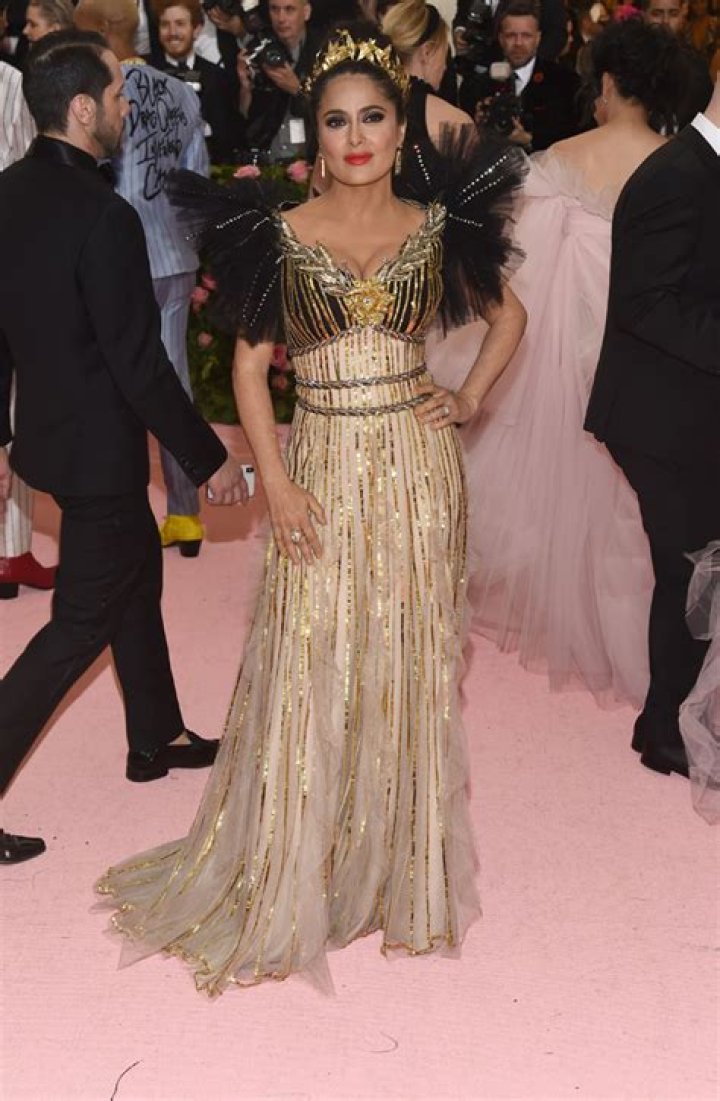 Salma Hayek Shows Off Her Fabulous Curves & Looks Like A Queen In Black & Gold Gucci Gown At Met Gala