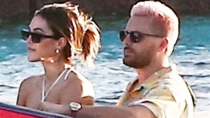 Amelia Hamlin Cuddles Up To Scott Disick On Romantic Boat Trip & Wears Pink Bikini Top To Match His New Hair