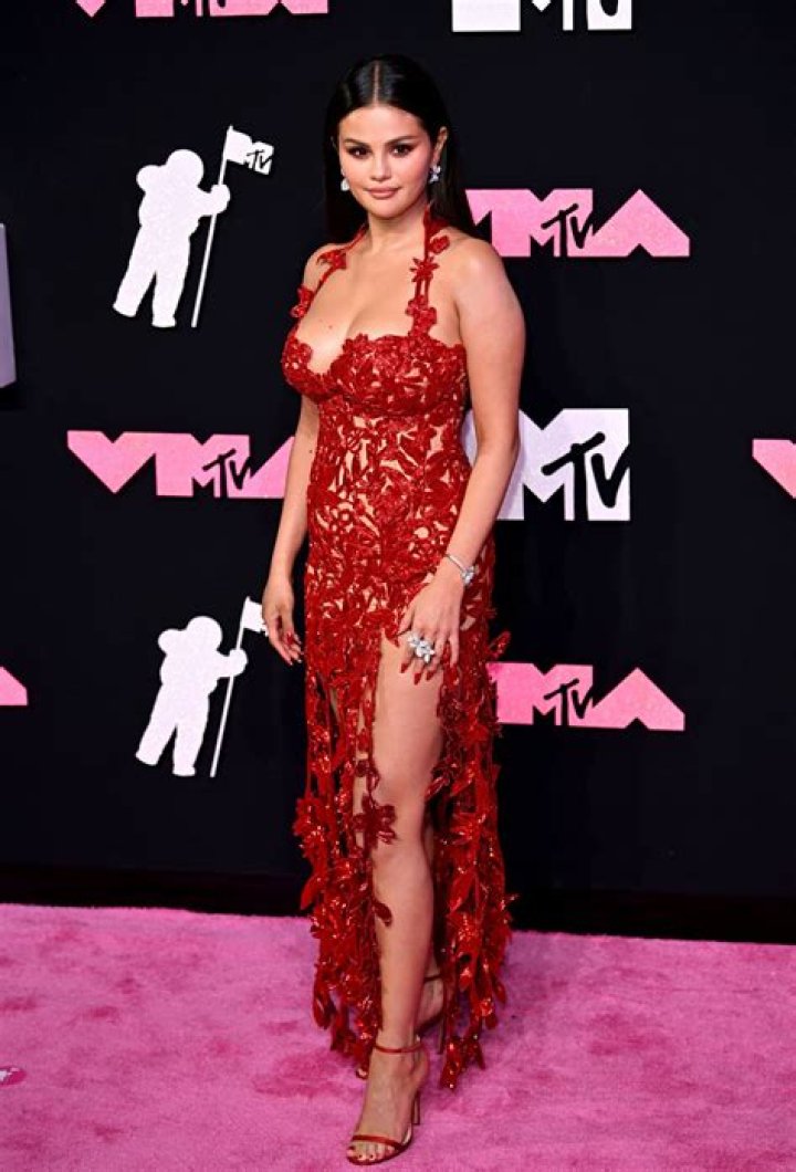 Selena Gomez Wears Red Swimsuit At Cousin’s Bachelorette Party — Pic – Hollywood Life