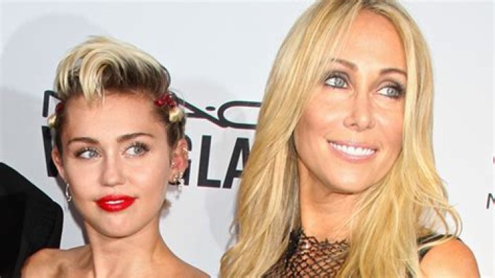 Tish Cyrus Cozies Up To New Husband Dominic Purcell Just Before Wedding To Support Miley’s New Music: Photo